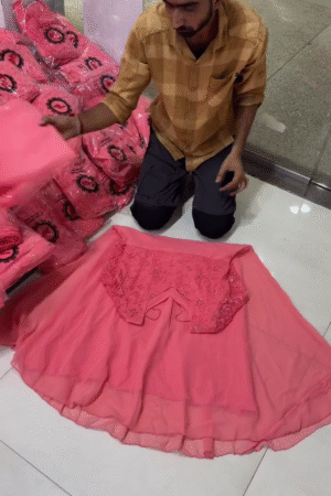Peachy Pink Net Lehenga Choli Set with Sequin Embroidered Blouse & Dupatta