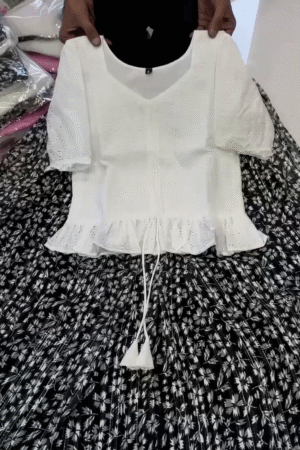 Elegant White Eyelet Cotton Top with Black Floral Skirt Set