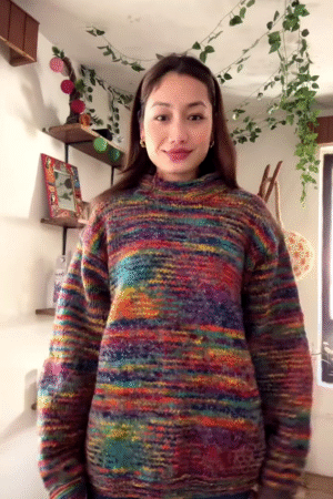 Handmade Multicolor Textured Knit Sweater 🌈🧶 – Cozy Rainbow Layer Styled in Decor-Rich Setting